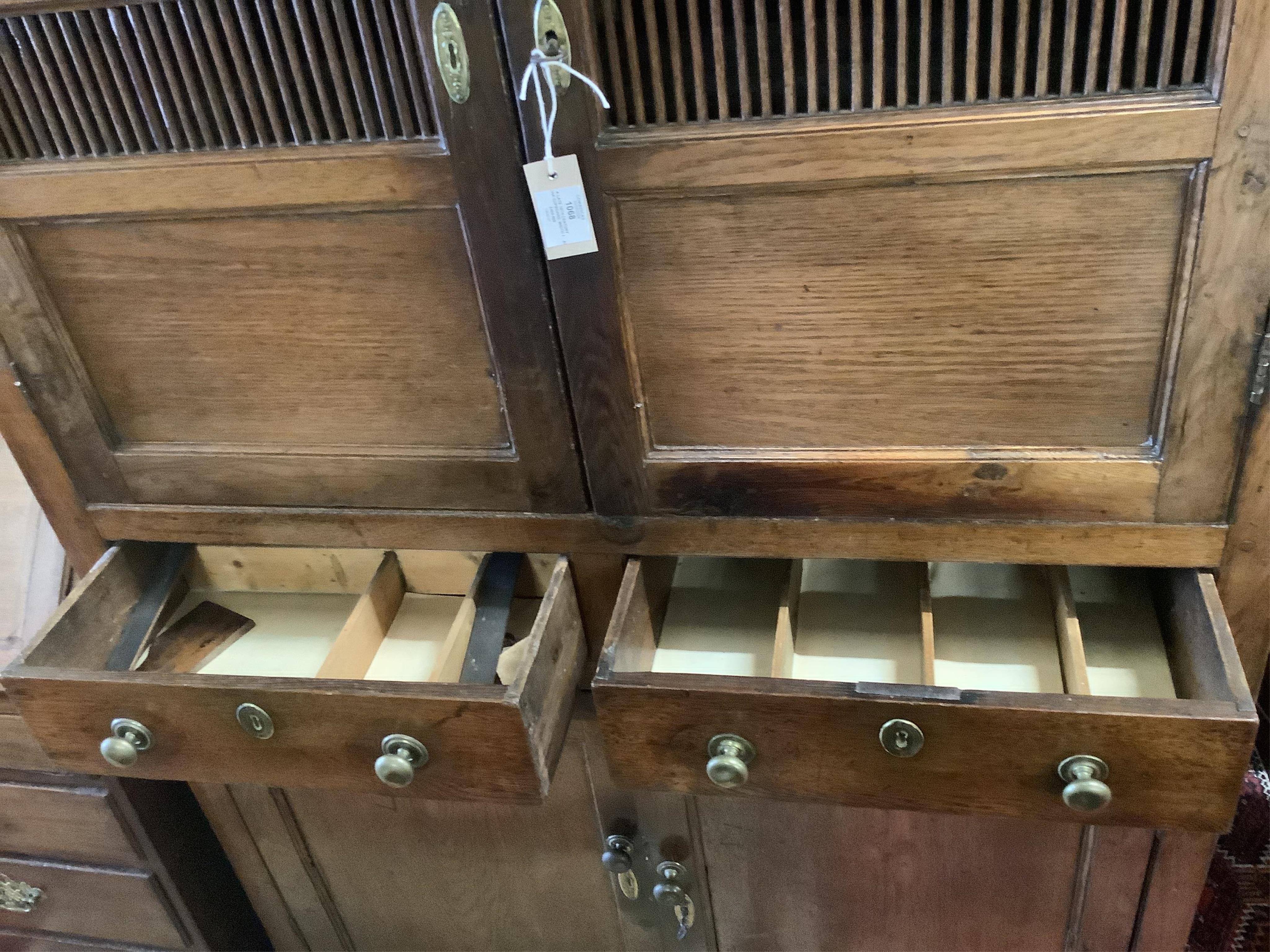 A late 18th century oak cupboard, width 113cm, height 186cm. Condition - fair to good